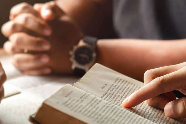 Bible studying while praying