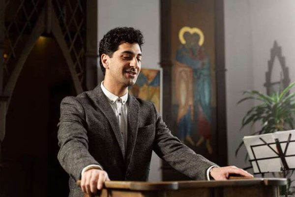 Men preaching in the church